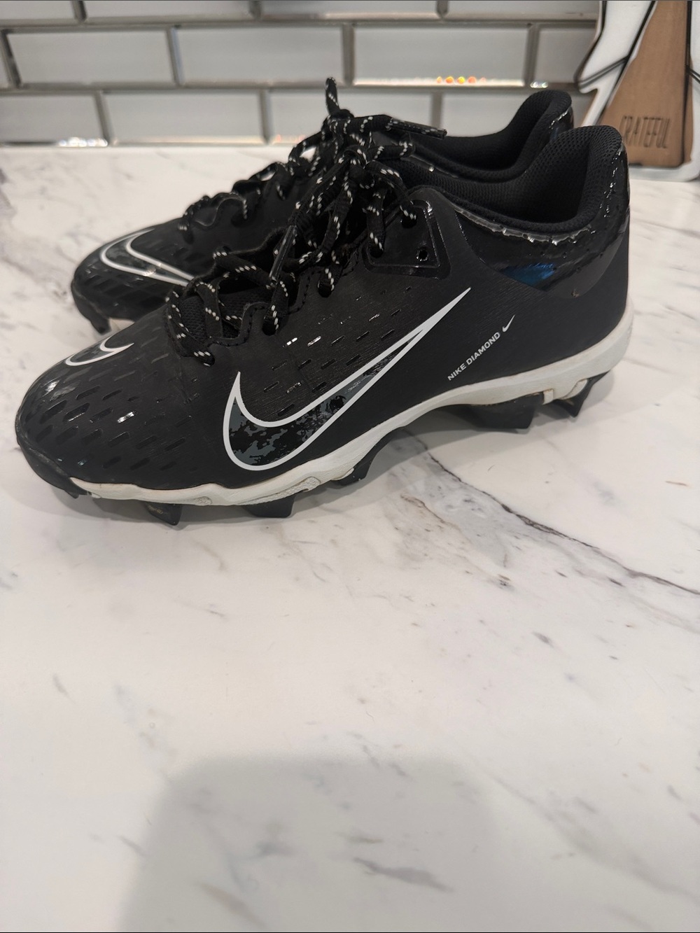 Nike Kids Black and White Cleats